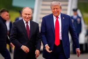 President Donald Trump greets Russian President Vladimir Putin as he arrives at Joint Base Elmendorf-Richardson on August 15, 2025 in Anchorage, Alaska.