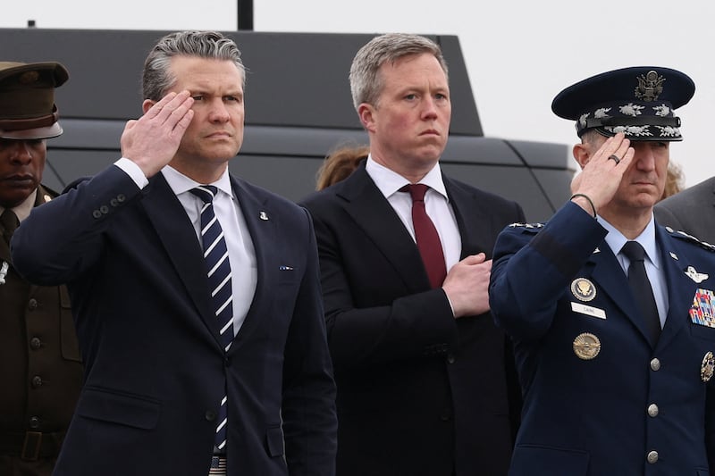 Hegseth, Driscoll, and Chairman of the Joint Chiefs of Staff Gen. Dan Caine pay their respects during a dignified transfer in March. There have been "months of tension" between Hegseth and Driscoll, the Wall Street Journal reported.