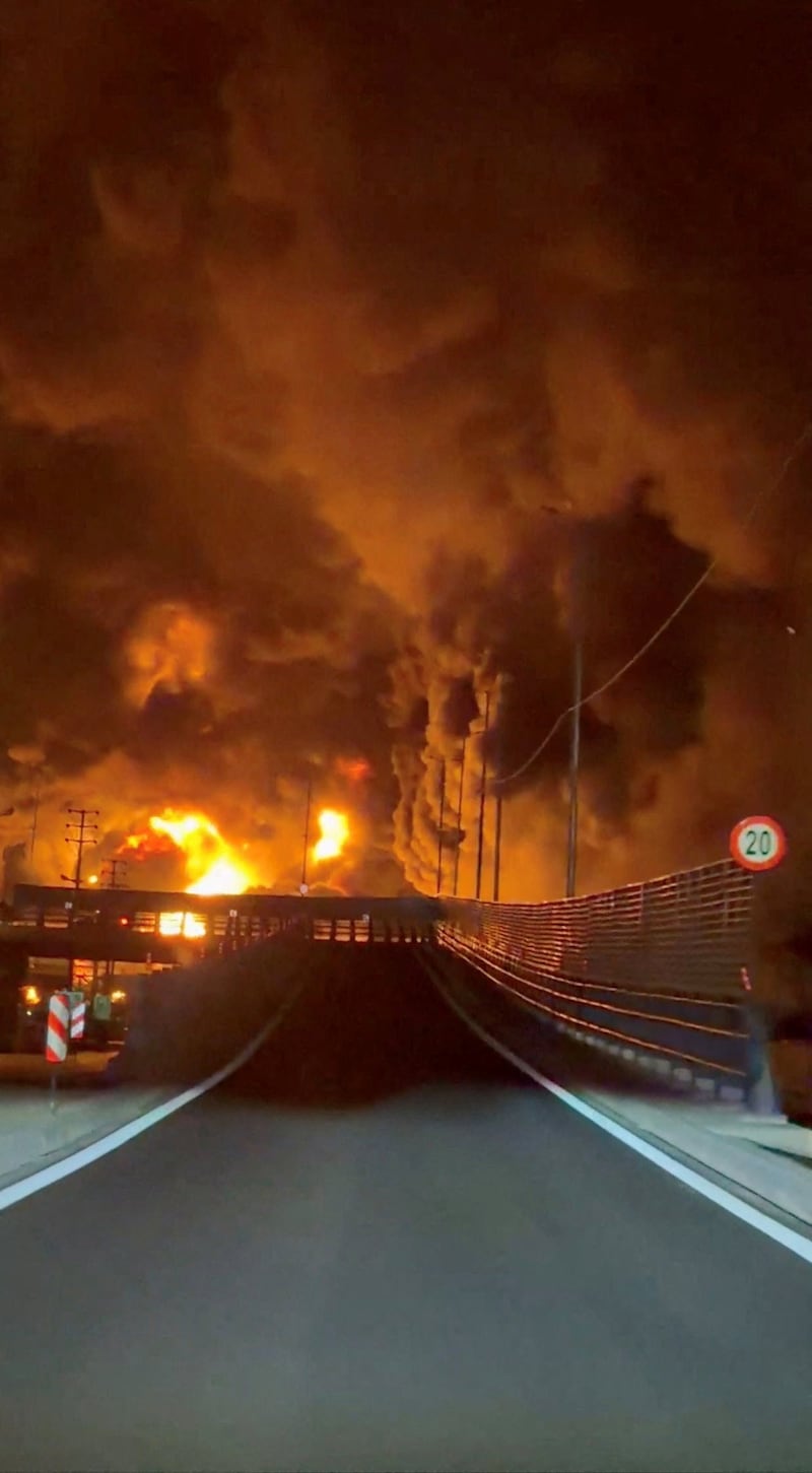 Fire burns and smoke rises from Aqdasieh Oil Depot after being reportedly hit by strike, amid the U.S.-Israeli conflict with Iran, in Tehran, Iran in this screengrab taken from a social media video released on March 8, 2026. SOCIAL MEDIA/via REUTERS  THIS IMAGE HAS BEEN SUPPLIED BY A THIRD PARTY. NO RESALES. NO ARCHIVES.  VERIFICATION: Reuters confirmed the location as Tehran by the road layout, utility poles and trees which match file and satellite imagery. The date of the video could not be verified, but no older version was found posted online before March 8.  Israeli military also wrote on Telegram that it had struck a number of fuel storage facilities in Tehran on March 8. Iran’s state agencies reported attacks on a number of oil depots on March 7. NASA FIRMS detected thermal activity on coordinate 35.790649529257415, 51.539333520742645 at 1:50 a.m. on March 8 (10:20 p.m. UTC March 7). The coordinates were tagged as Petrol Storage Aqdasieh on the online map.
