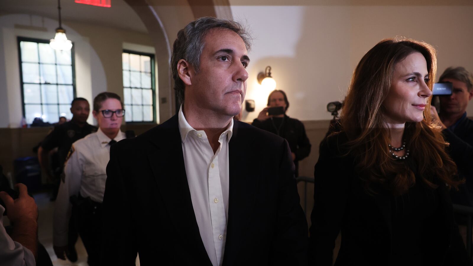 A photo of Michael Cohen entering the Trump trial