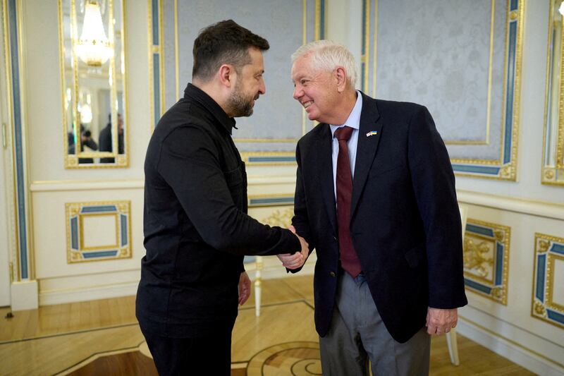Volodymyr Zelenskiy  and Lindsey Graham