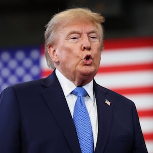 President Donald Trump arrives to deliver remarks on August 14, 2026 in Garden City, New York.