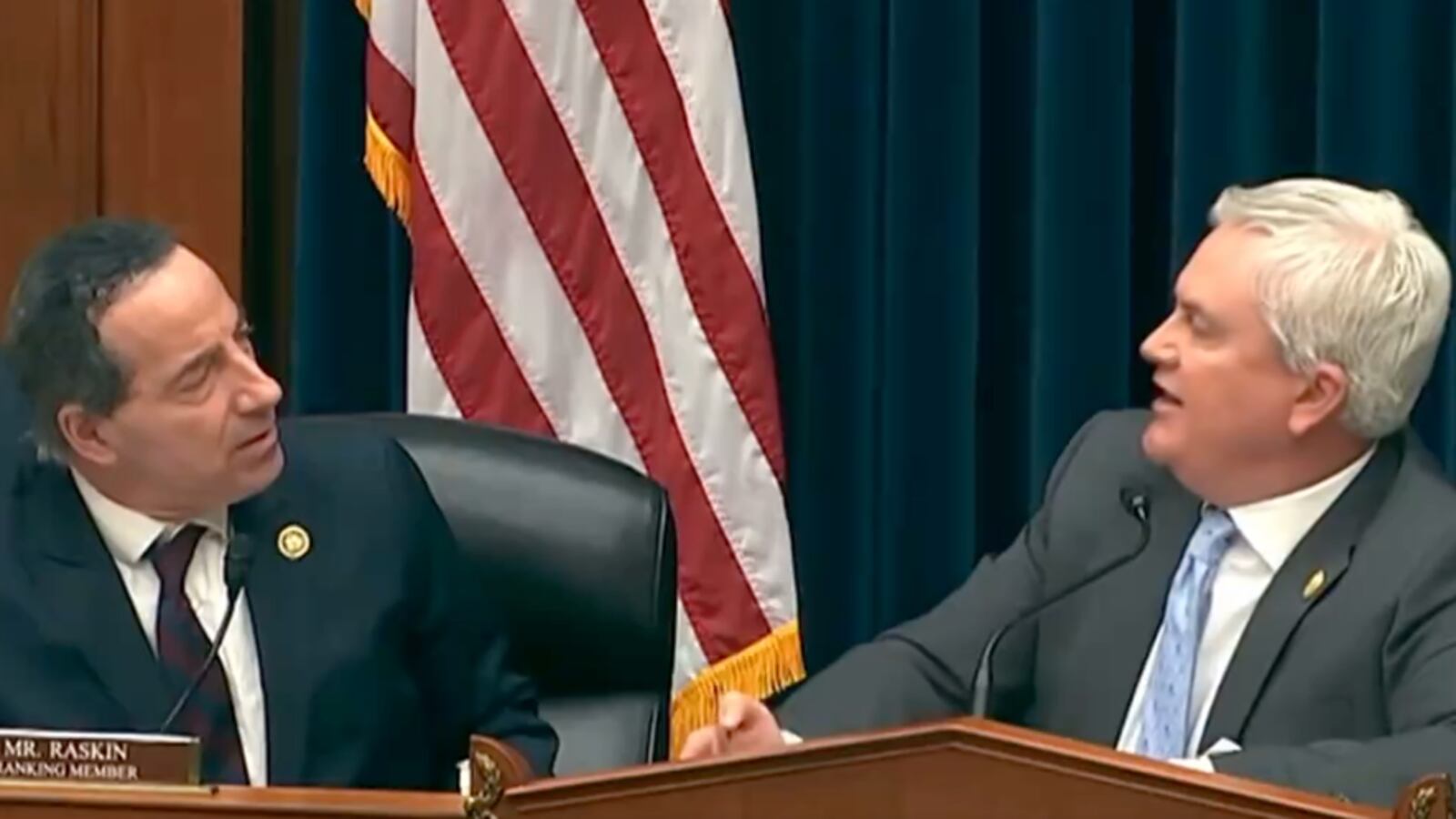 Jamie Raskin, left, and James Comer, right, argue with each other during a committee meeting.