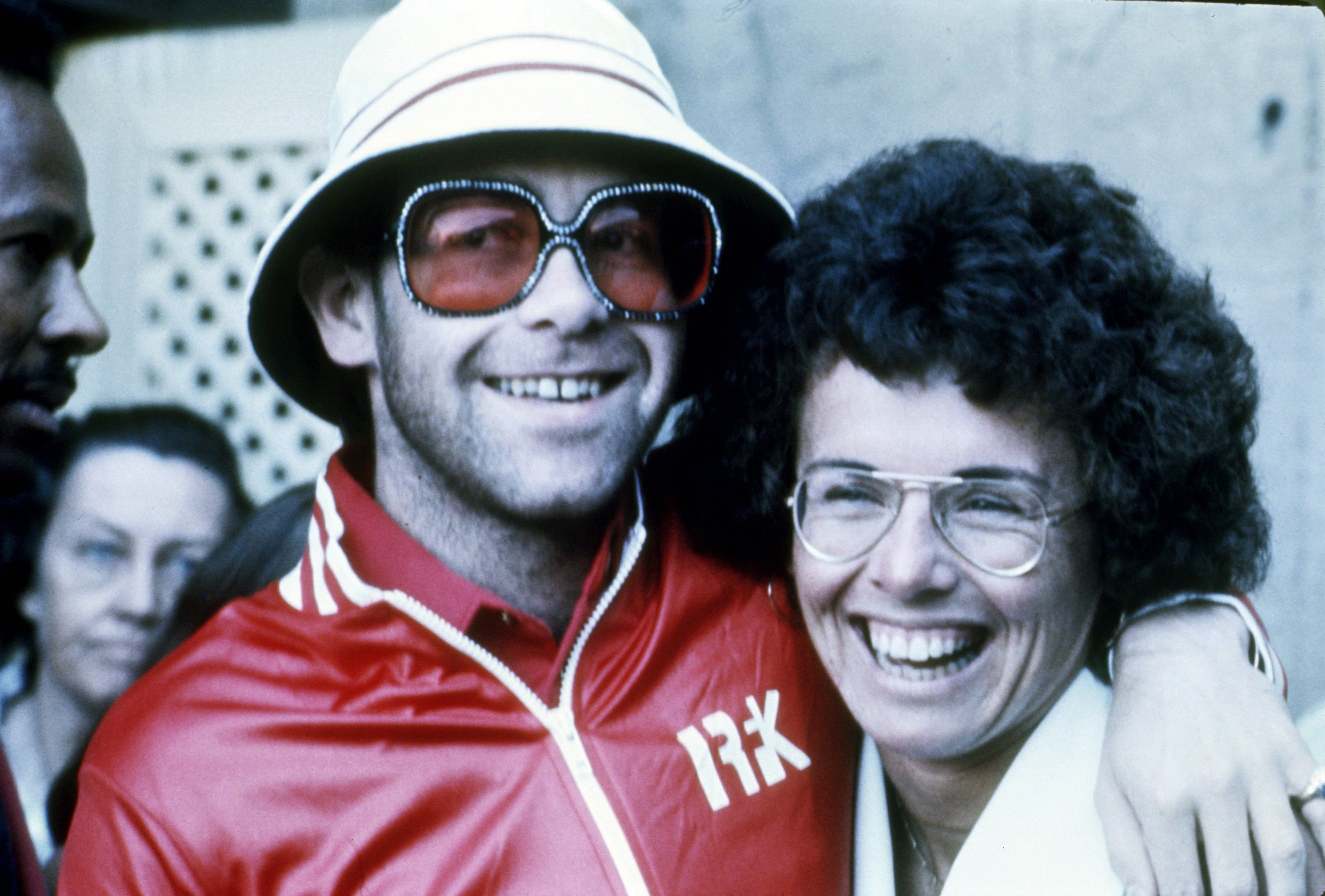 Longtime friends Elton John and Billie Jean King photographed at the Forest Hills Tennis Stadium in New York City, circa 1975.