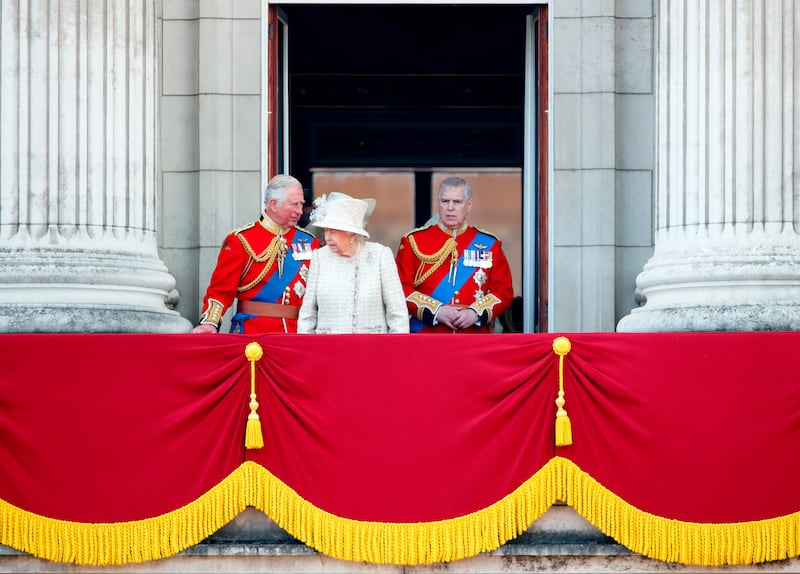 Then Prince-Charles and Prince Andrew are pictured with Queen Elizabeth II on the balcony of Buckingham Palace on June 8, 2019 in London.