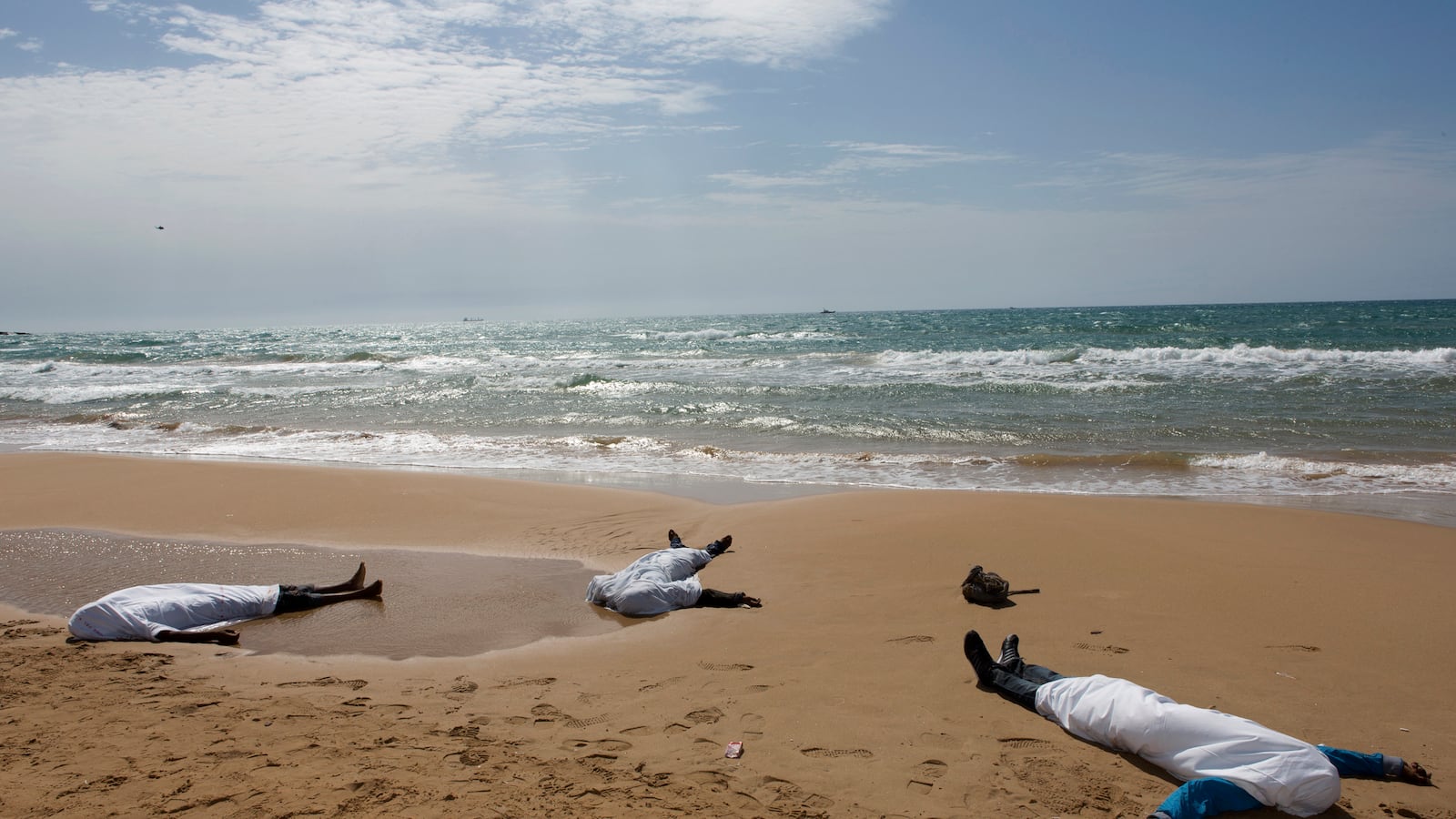 articles/2013/10/03/italy-s-shipwrecked-syrians-fare-better-than-most-migrants/131003-Nadeau-Tragedy-tease-02_uy3jnx