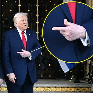 Donald Trump and Benjamin Netanyahu with a closeup of Donald Trump's hand