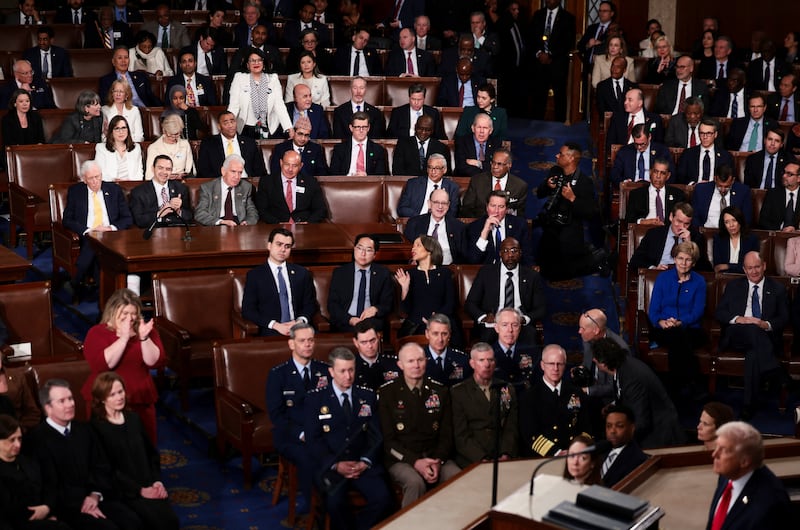 Lawmakers atch during President Donald Trump’s State of the Union address to a joint session of Congress at the U.S. Capitol in Washington, D.C., U.S., February 24, 2026.