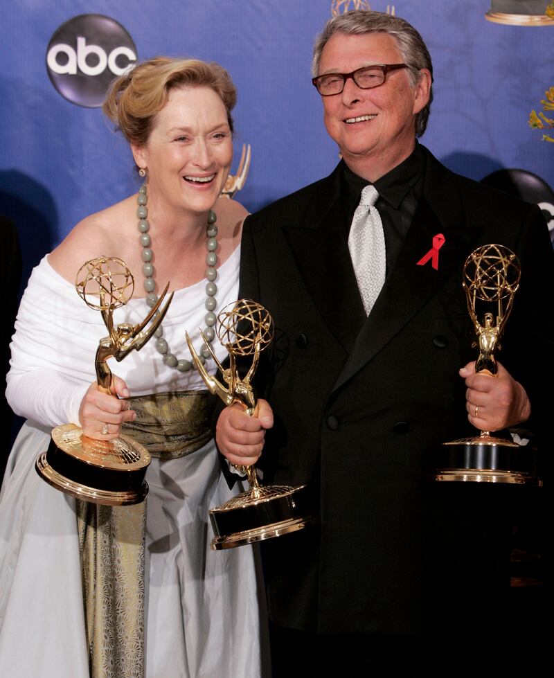 LOS ANGELES - SEPTEMBER 19:  Actress Meryl Streep and director Mike Nichols, winners for Outstanding Miniseries for HBO's "Angels in America", pose backstage during the 56th Annual Primetime Emmy Awards at the Shrine Auditorium September 19, 2004 in Los Angeles, California