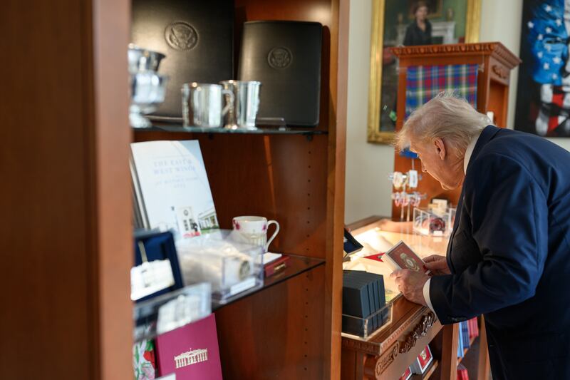 President Donald Trump visits the gift shop in the East Wing of the White House, Tuesday, August 5, 2025.