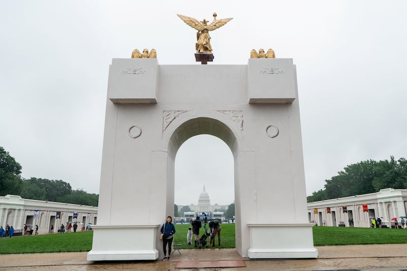 A smaller replica of U.S. President Donald Trump’s proposed 250-foot ‘Triumphal Arch’ stands in the rain during The Great American State Fair on the National Mall in Washington, D.C., U.S., June 28, 2026.