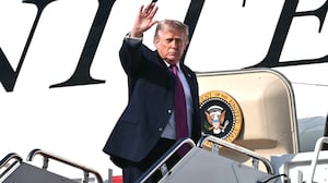 US President Donald Trump waves as he boards Air Force One before departing Joint Base Andrews, Maryland, on July 3, 2026. Trump is heading to South Dakota where he will deliver remarks at Mt. Rushmore.