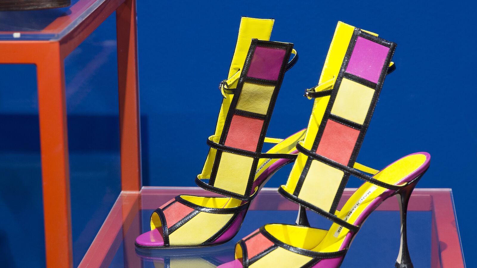 articles/2015/07/20/from-cinderella-to-carrie-bradshaw-via-run-dmc-why-we-just-love-shoes/150719-shire-shoes-exhibit-tease_wbxwrm