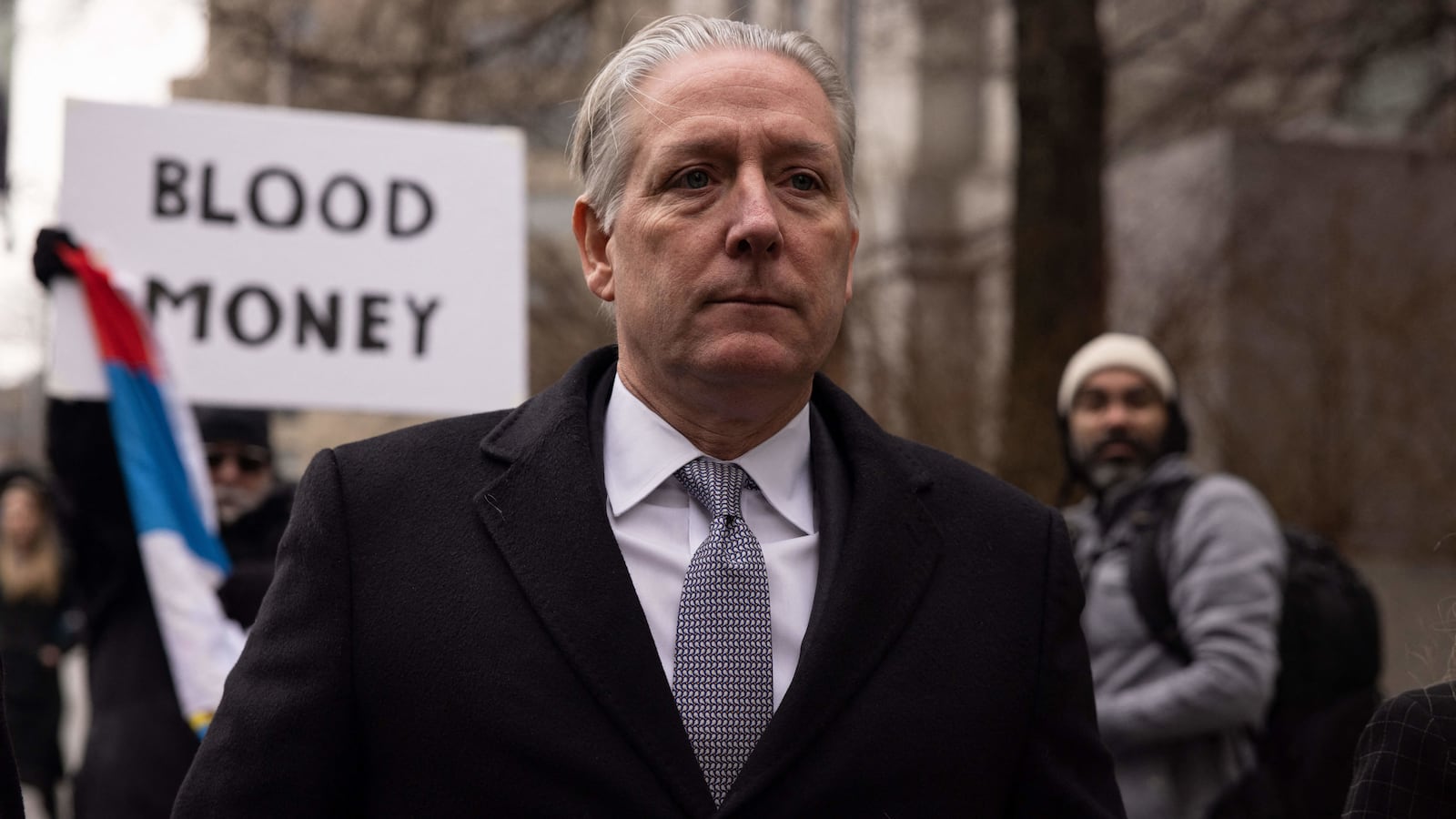 Former FBI agent Charles McGonigal leaves Manhattan Federal Court in New York.