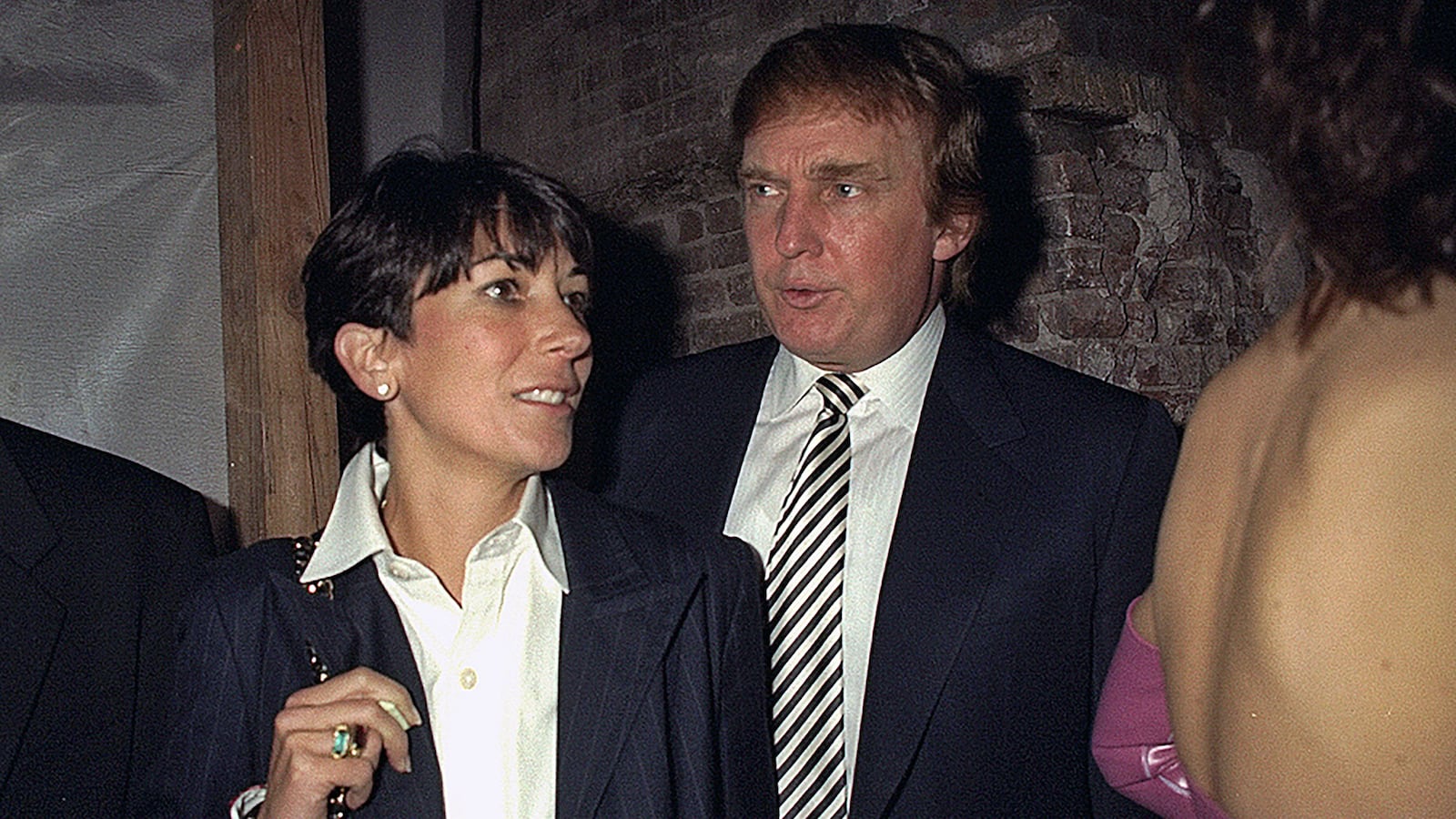 Ghislaine Maxwell and Donald Trump at the 50th anniversary for both the Ford Modeling Agency and Pantene hair care products in Manhattan on October 30, 1997