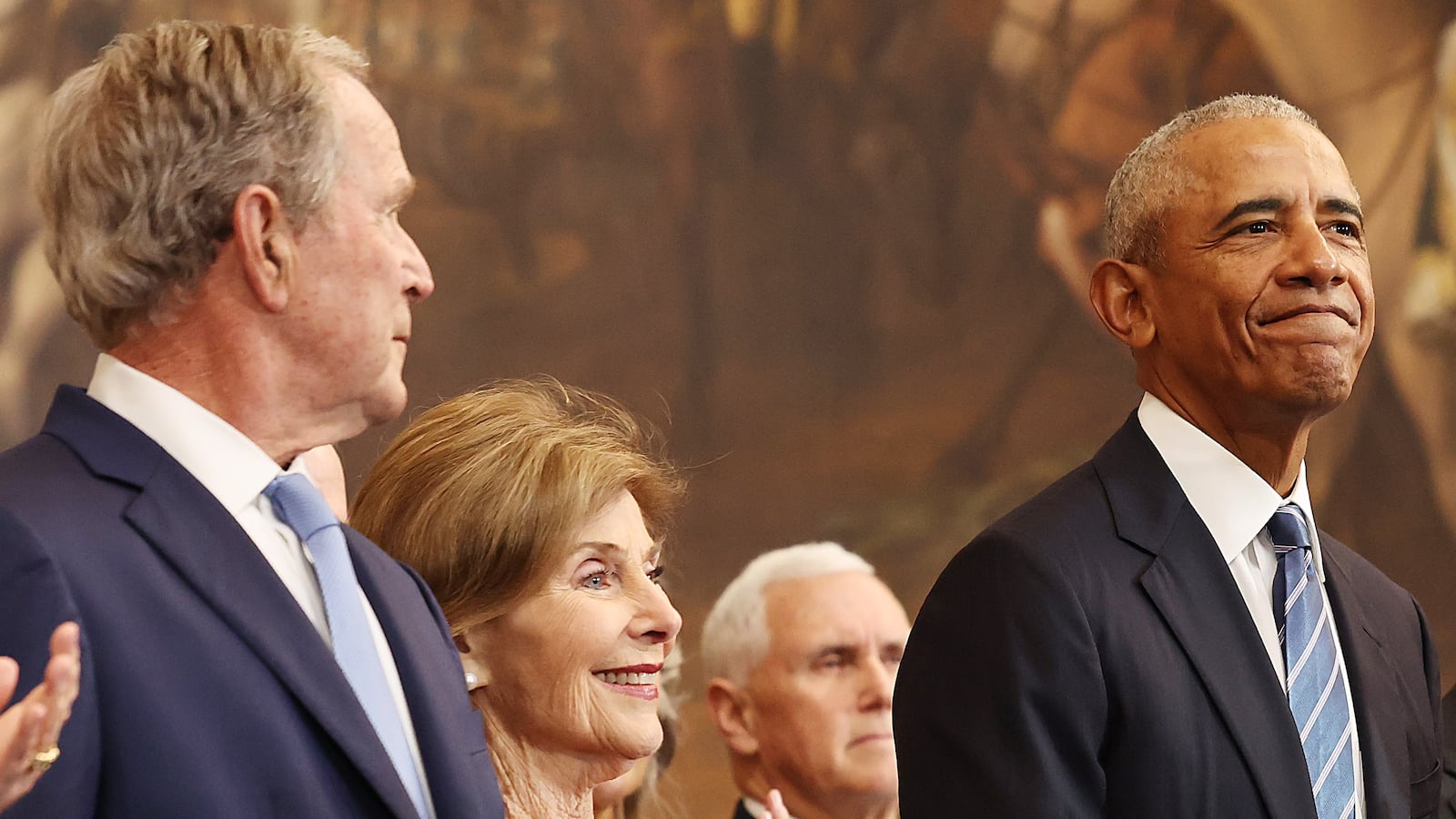 Former U.S. President George W. Bush, former first lady Laura Bush and former U.S. President Barack Obama.
