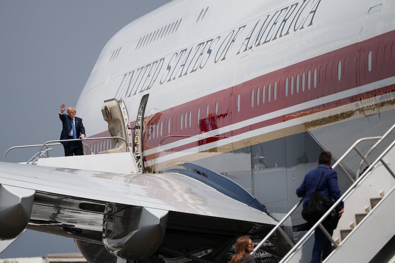 HOUSTON, TEXAS - AUGUST 28: U.S. President Donald Trump waves as he boards Air Force One at Ellington Airport on August 28, 2026 in Houston, Texas. President Trump is returning to Washington, DC following a ceremony honoring Artemis II crew members at NASA's Johnson Space Center. (Photo by Win McNamee/Getty Images)
