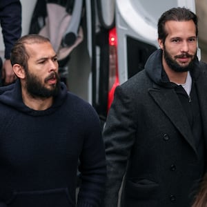 Andrew Tate and his associates were released from a Romanian prison on Friday and placed under house arrest.
