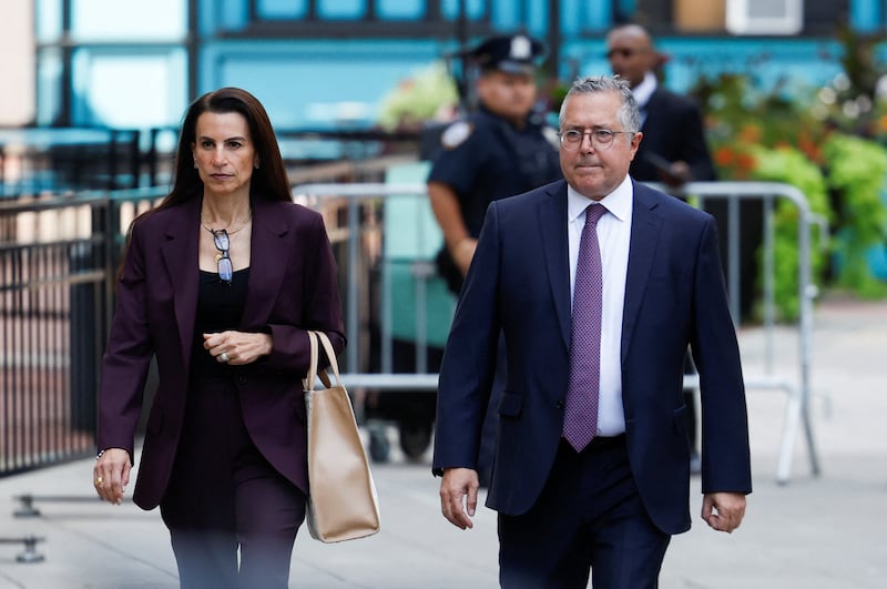 Mangione's lawyers, Karen Friedman Agnifilo and Marc Agnifilo, outside the courthouse.