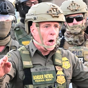 Border Patrol Chief Gregory Bovino of the El Centro Sector stands amid a protest outside an ICE facility in Broadview