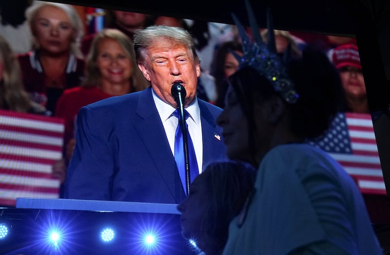 A screen shows U.S. President Donald Trump speaking during the Republican National Midterm Convention in Dallas, Texas, U.S., September 9, 2026. REUTERS/Eric Lee/Pool
