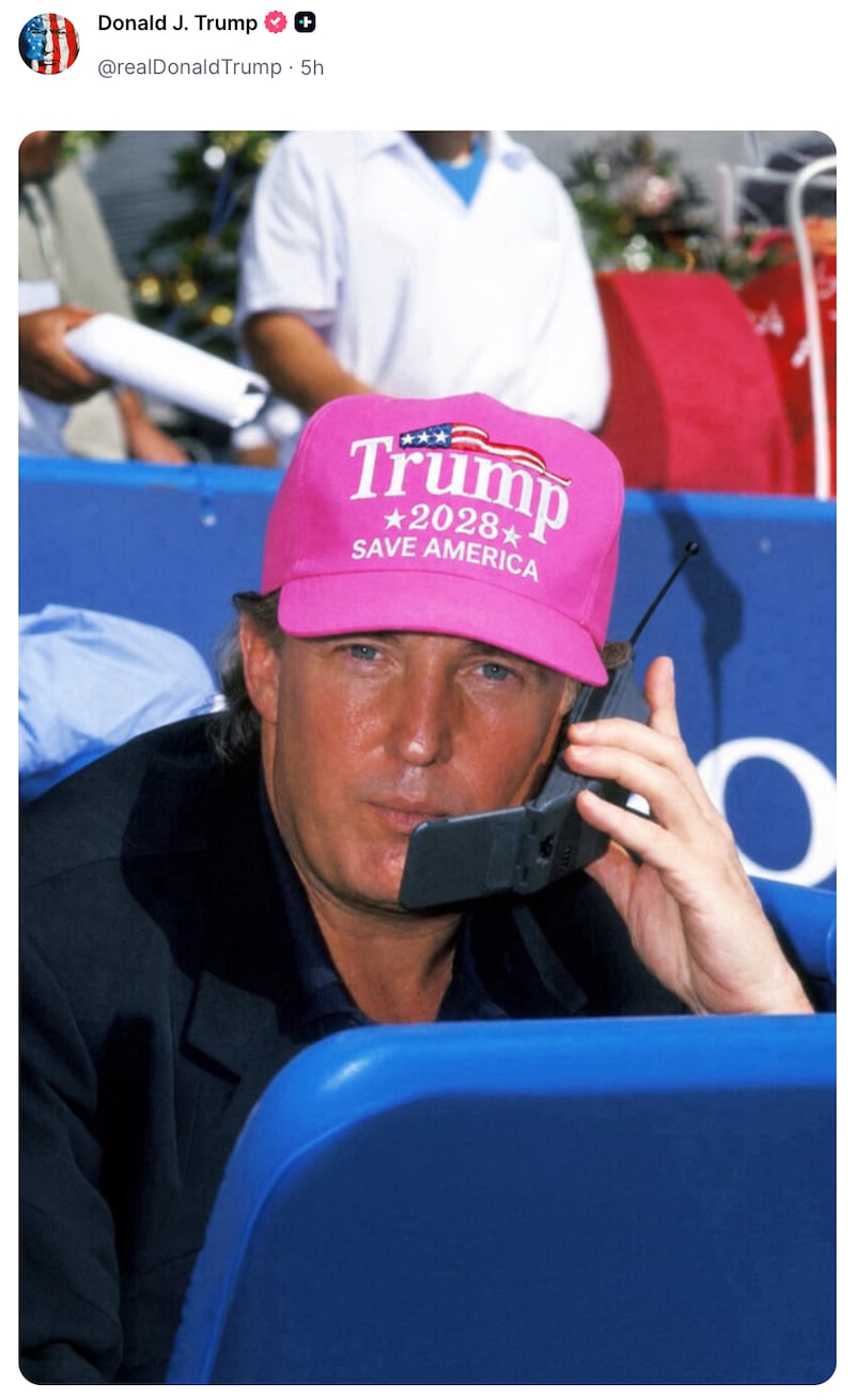 Donald Trump posts an AI-generated photo of himself wearing a pink Trump 2028 cap.