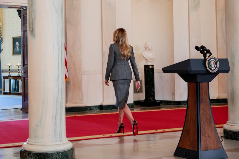 U.S. first lady Melania Trump departs after delivering remarks regarding the late financier and convicted sex offender Jeffrey Epstein from the Grand Foyer of the White House in Washington, D.C., U.S., April 9, 2026. REUTERS/Evan Vucci