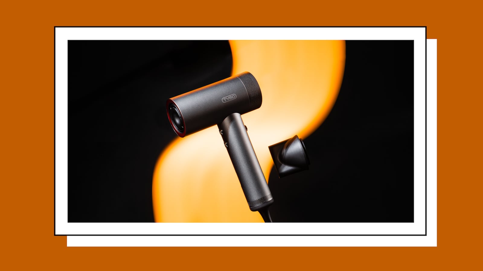 A Hairdryer on a black and yellow background.