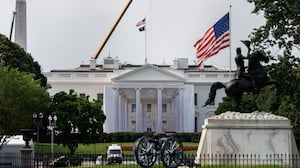 A tarp covers scaffolding on the North Portico of the White House, Friday, July 10, 2026, in Washington.