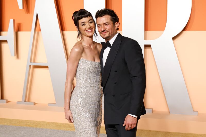 Katy Perry and Orlando Bloom attend the 2025 Vanity Fair Oscar Party hosted by Radhika Jones at Wallis Annenberg Center for the Performing Arts on March 02, 2025 in Beverly Hills, California.