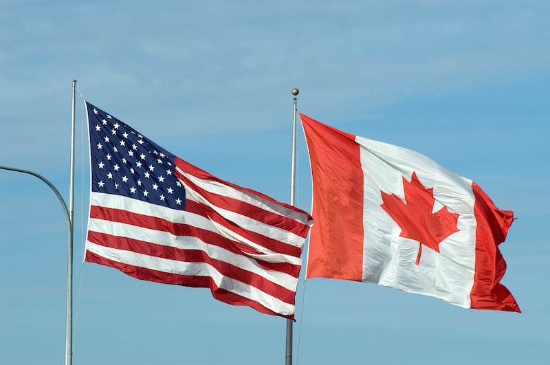 American and Canadian flags