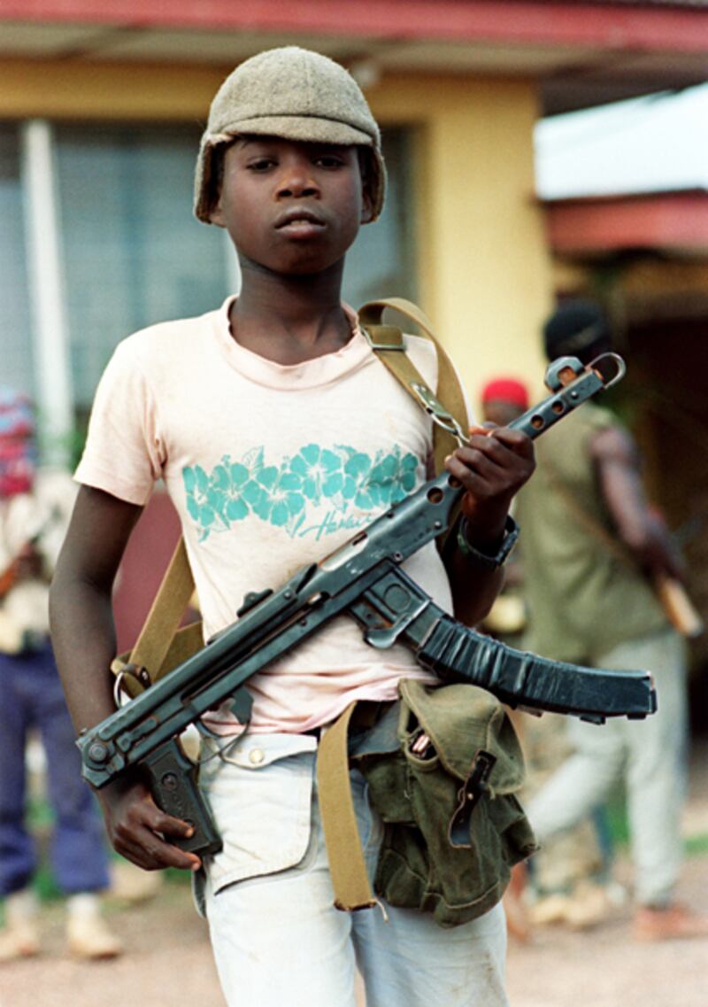 galleries/2012/04/26/charles-taylor-verdict-liberian-warlord-s-alleged-atrocities-photos/liberia-child-soldier-1990_hzzesg
