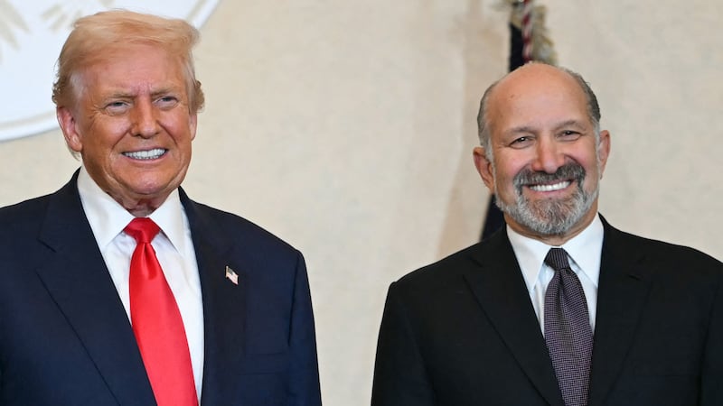 US President Donald Trump (C) and US Secretary of Commerce Howard Lutnick (R) pose with Taro Shimada, CEO of Toshiba, during a business leaders event at the US ambassador's residence in Tokyo on October 28, 2025. (Photo by ANDREW CABALLERO-REYNOLDS / AFP) (Photo by ANDREW CABALLERO-REYNOLDS/AFP via Getty Images)