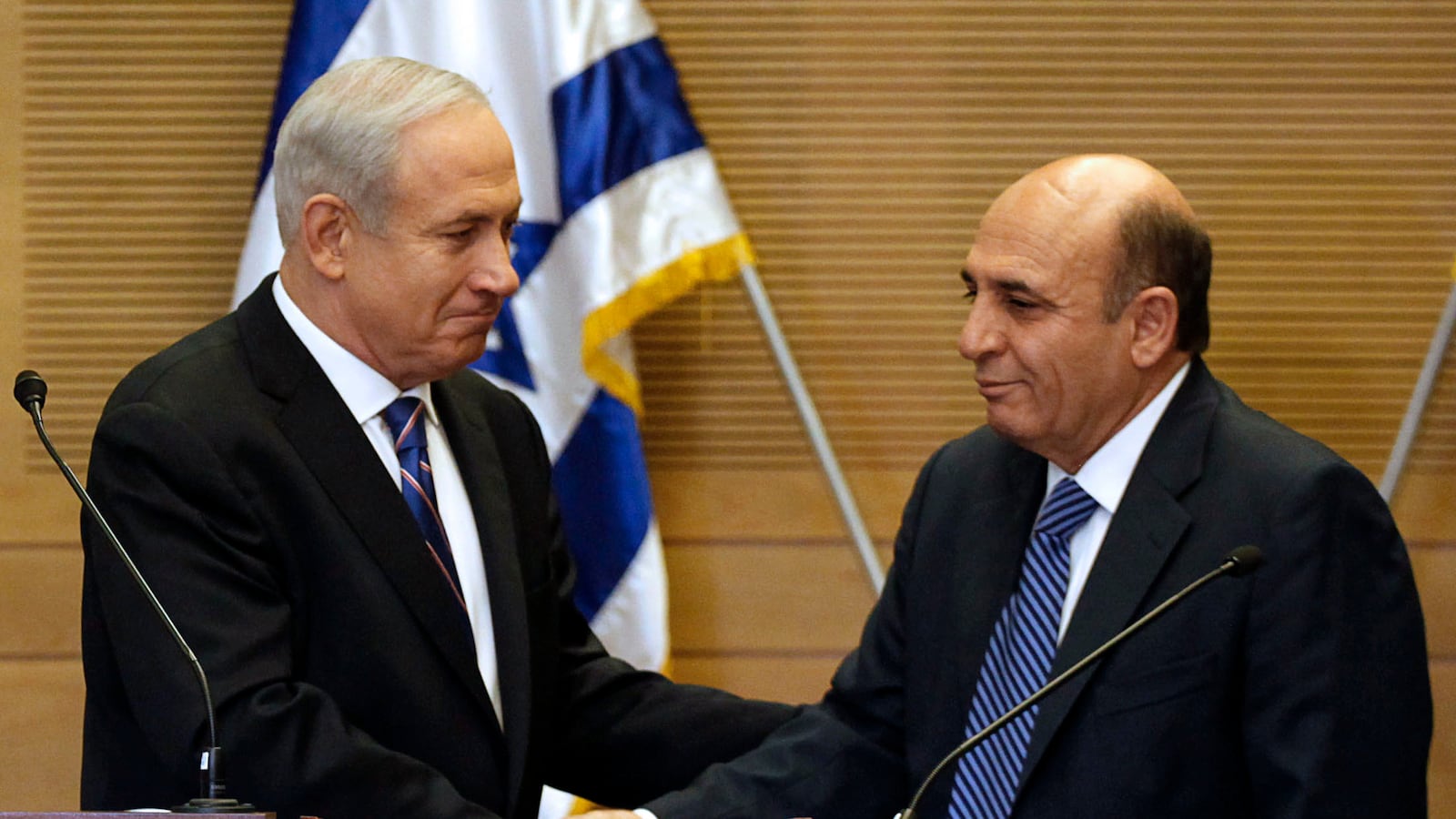 articles/2012/05/08/october-surprise/netanyahu-mofaz-shake-openz_ebgsvd