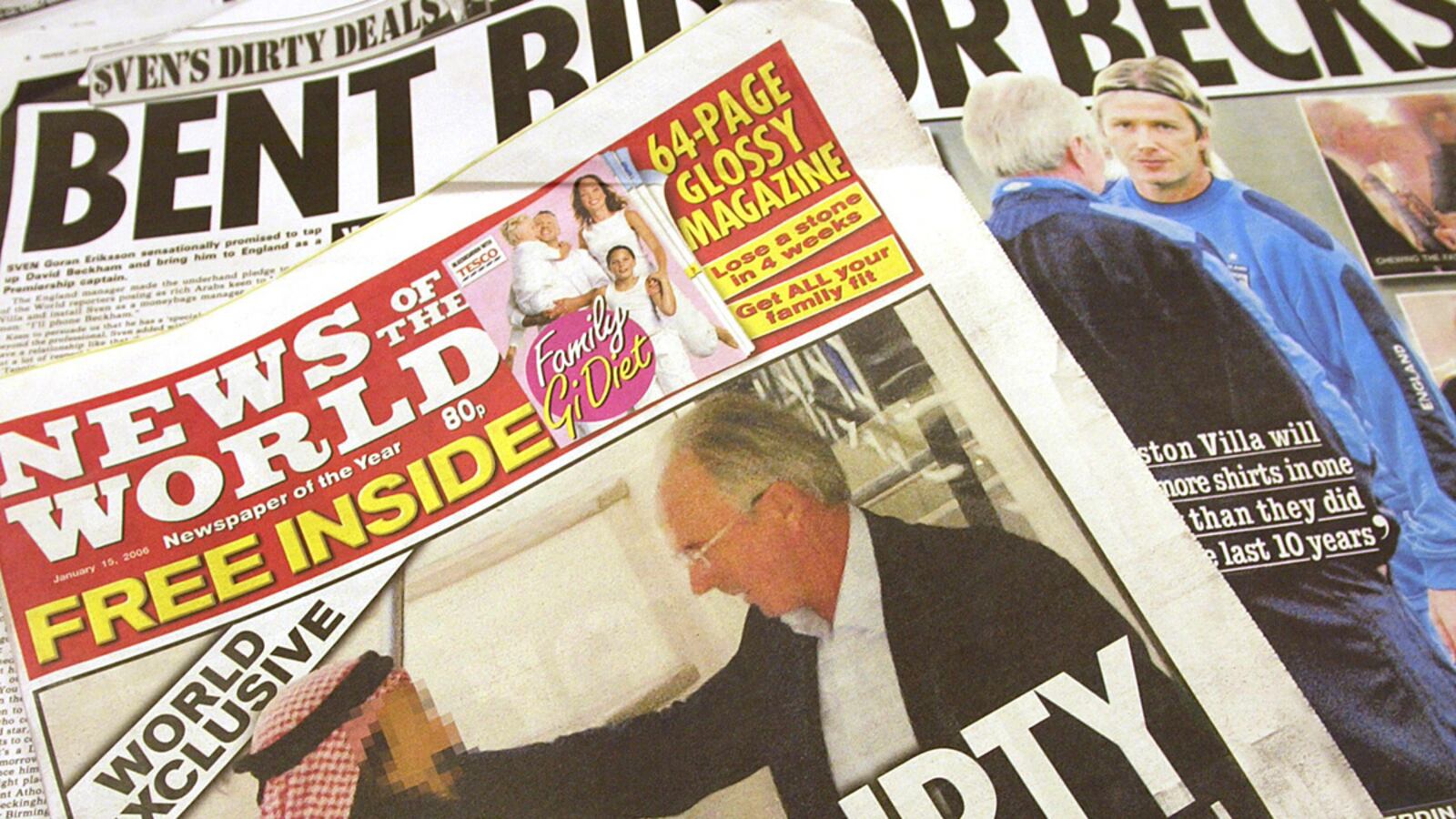 cheats/2011/07/09/third-man-arrested-in-news-of-the-world-investigation/tabloid-scandals-tease_gw1wty