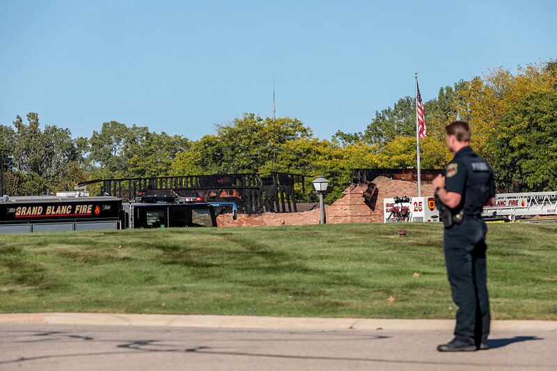 The burned church as emergency services respond to a shooting and fire at the Church of Jesus Christ of Latter-day Saints on September 28, 2025 in Grand Blanc, Michigan. Police said there are multiple victims and the shooter is down. (Photo by Bill Pugliano/Getty Images)