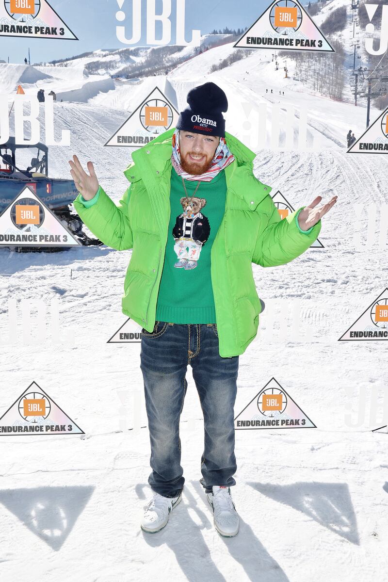 Photograph of Angus Cloud attending an event in a green jacket.