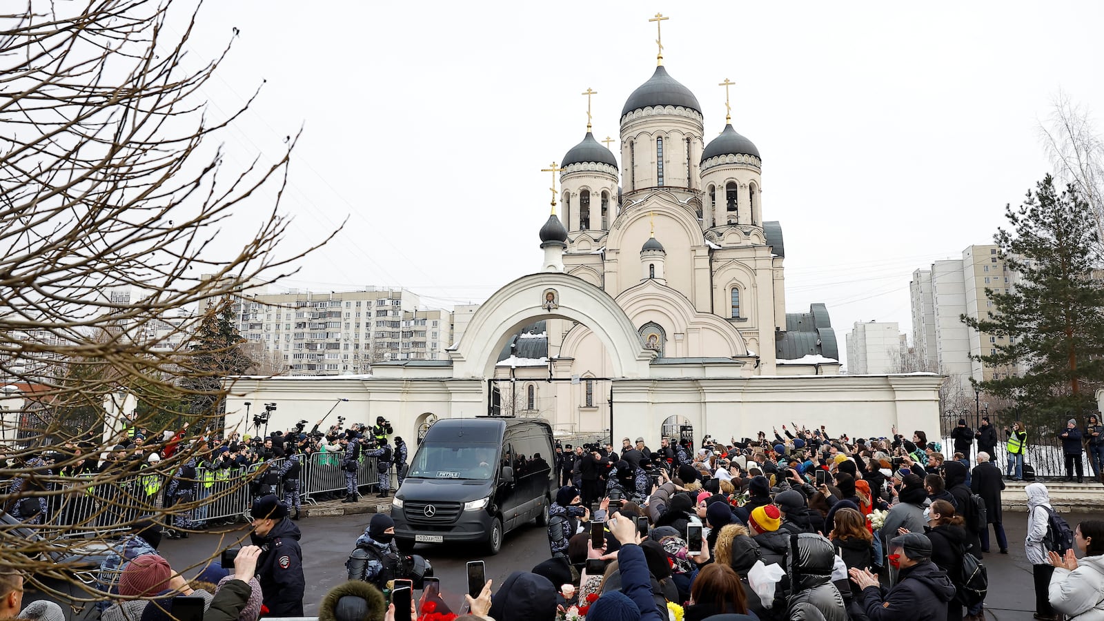 A hearse, which reportedly transports a coffin with the body of Russian opposition politician Alexei Navalny, is parked outside the Soothe My Sorrows church before a funeral service and farewell ceremony in Moscow, Russia, March 1, 2024.