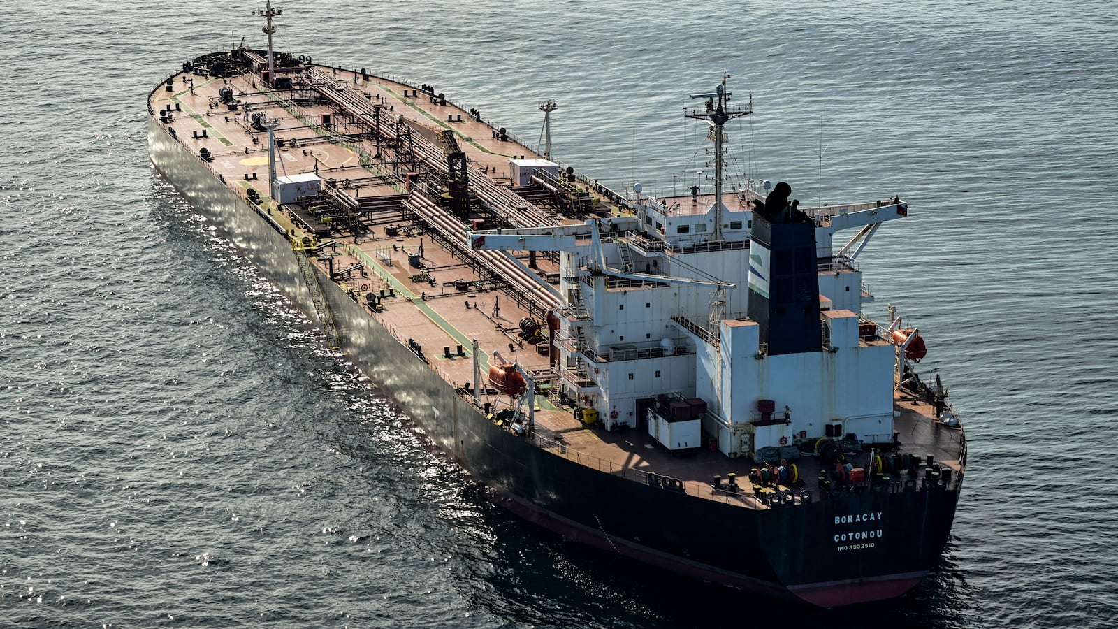 his aerial picture taken on October 1, 2025 off the coast of the western France port of Saint-Nazaire shows the tanker Boracay from Russia's so-called "shadow fleet" suspected of being involved in drone flights over Denmark which sailed off the Danish coast between September 22 and 25. Named the Pushpa or Boracay,