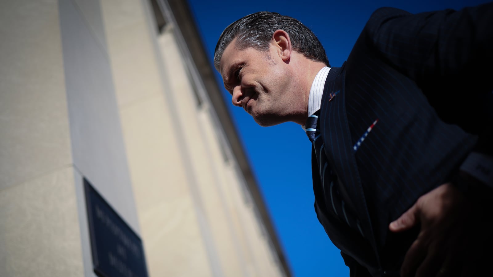 Newly confirmed Secretary of Defense Pete Hegseth arrives at the Pentagon, as agencies begin to implement Trump's executive orders on DEI initiatives.