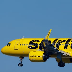 A Spirit Airlines jet on approach to land