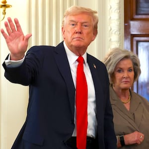 President Donald Trump departs with White House Chief of Staff Susie Wiles in the State Dining Room of the White House on October 08, 2025 in Washington, DC.