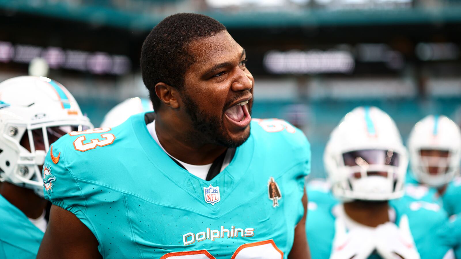 Calais Campbell #93 of the Miami Dolphins gives a speech in the team huddle prior to an NFL preseason football game against the Washington Commanders at Hard Rock Stadium on August 17, 2024 in Miami Gardens, FL.