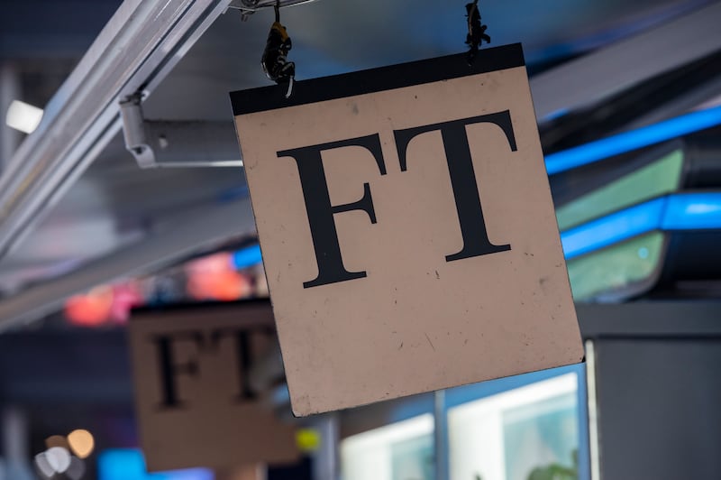 Financial Times logo seen at a newsstand in Hong Kong.