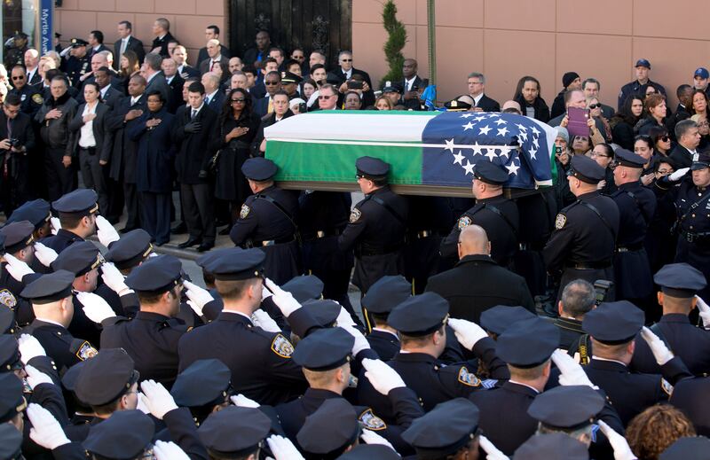 galleries/2014/12/27/the-nypd-says-farewell-to-officer-ramos/141227-police-funeral-12_wq70wu