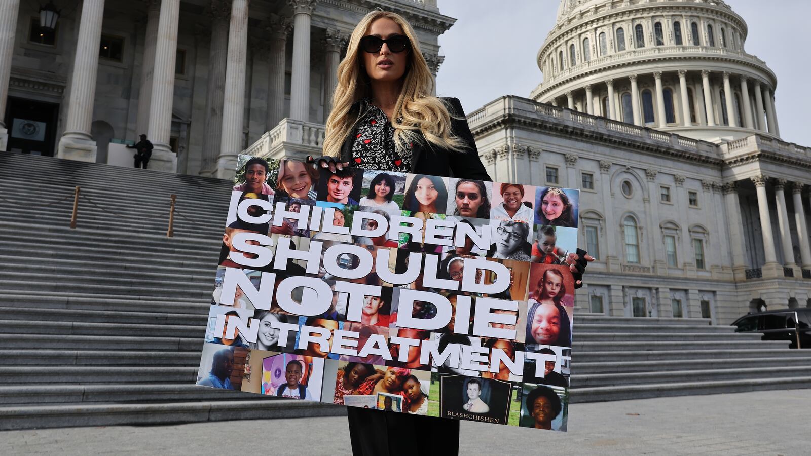 Celebrity hotel heiress Paris Hilton poses for photographs outside the U.S. Capitol on the day the House of Representatives is set to vote on The Stop Institutional Child Abuse Act on December 17, 2024 in Washington, DC.