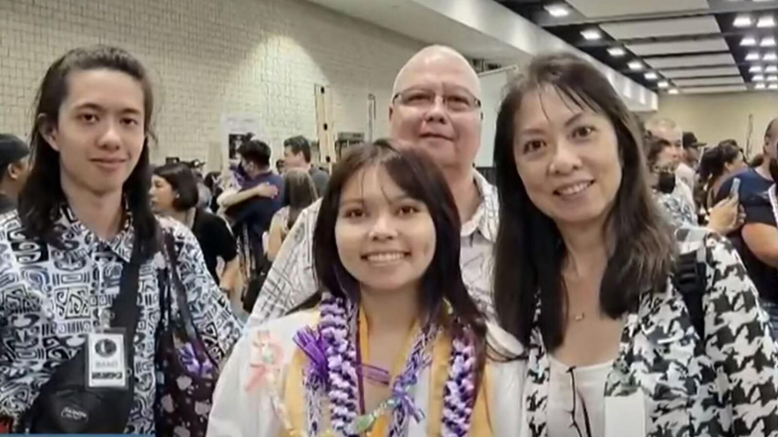 Jarek Agcaoili, left, with his mother, Danielle, sister, Jessika, and father, Maury Agcaoili, pose in May 2023.