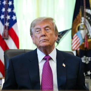US President Donald Trump speaks after signing an executive order that aims to rename Lake Ontario to Lake America in the Oval Office of the White House in Washington, DC, on August 27, 2026. (Photo by Jim WATSON / AFP via Getty Images)