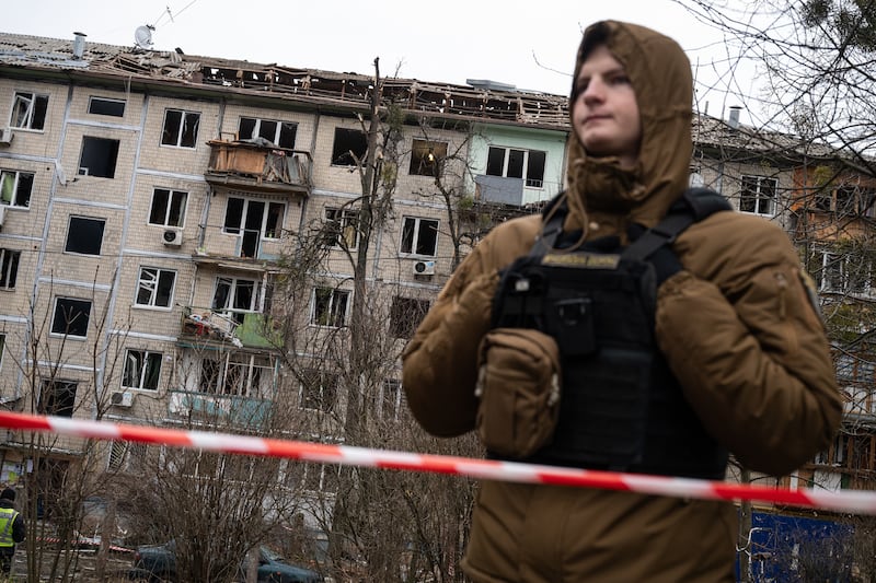 KYIV, UKRAINE - DECEMBER 23: A view of damage at the site of a Russian drone attack, where buildings and surrounding infrastructure were affected by the strike in Kyiv, capital of Ukraine on December 23, 2025. (Photo by Danylo Antoniuk/Anadolu via Getty Images)