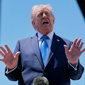 U.S. President Donald Trump speaks to the media before departing Palm Beach International Airport en route to Joint Base Andrews, in West Palm Beach, Florida, U.S., April 25, 2026. REUTERS/Kylie Cooper